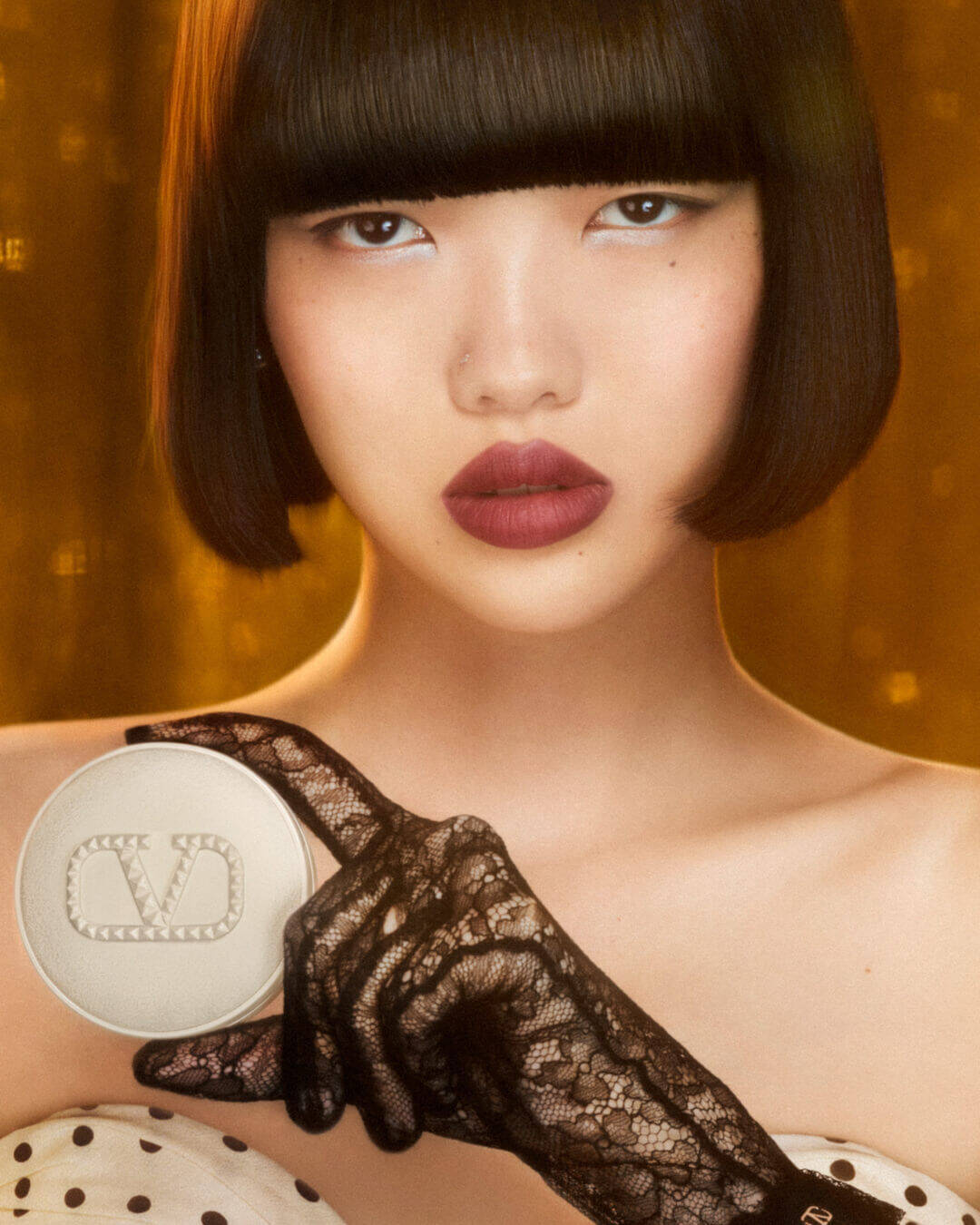 A beautiful girl wearing SPIKE VALENTINO IVORY.