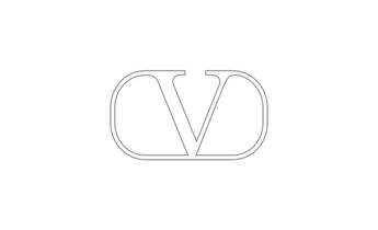 A close-up of a creamy, beige substance with a glossy texture, featuring the embossed logo "D" and "V" in a stylish font.