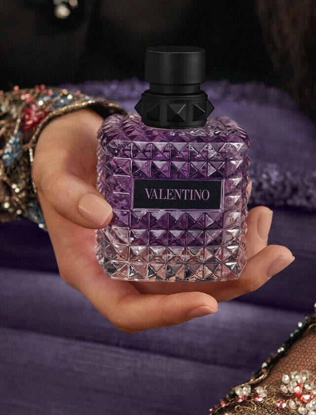 Born In Roma Purple Bottle in Hand