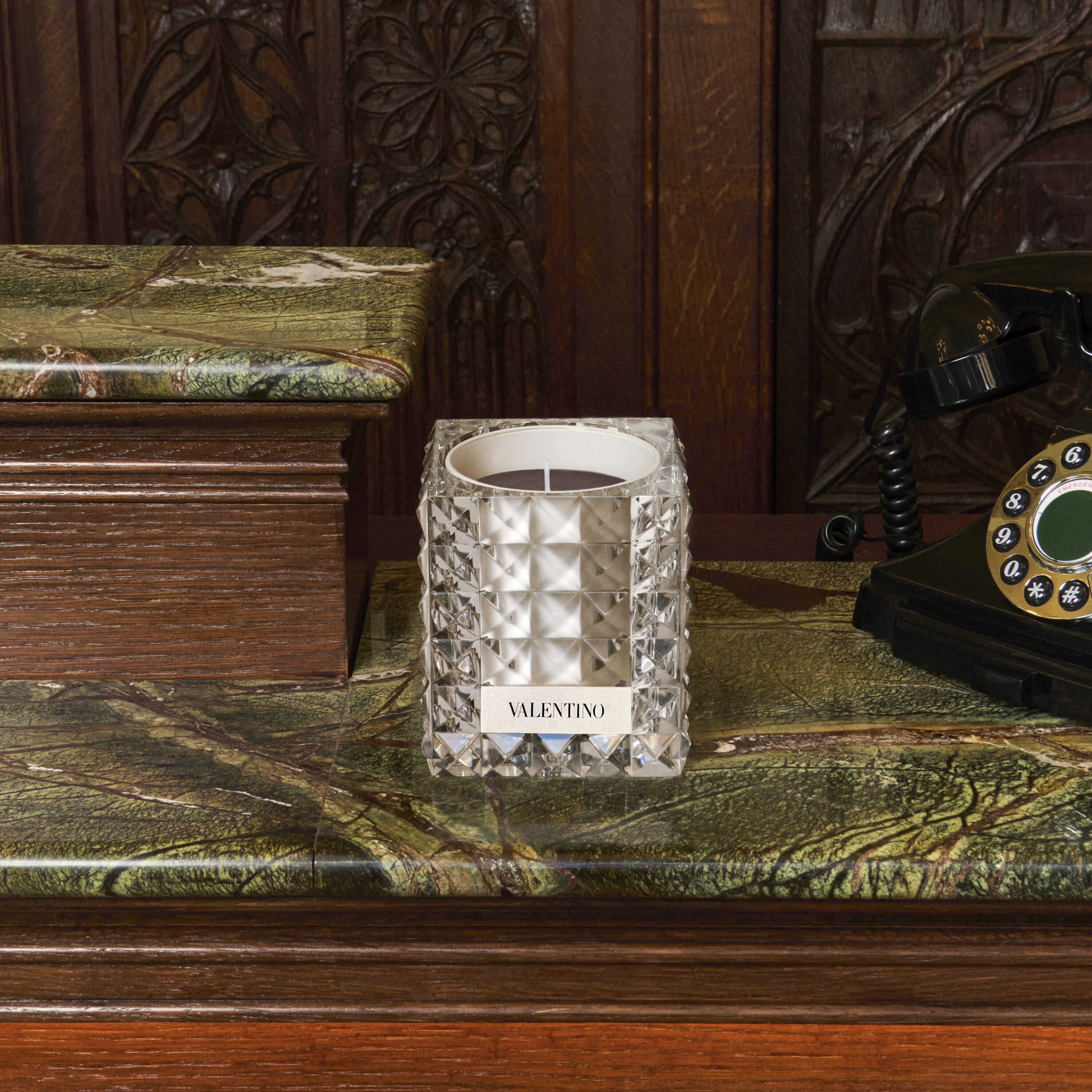 CIRE NOIRE ENCASED IN GLASS